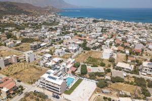 an aerial view of a city next to the ocean at Sapphire Horizon Suites in Kissamos