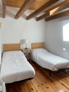 سرير أو أسرّة في غرفة في Villa Marissa