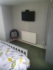 A television and/or entertainment center at Star And Garter 