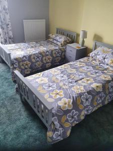 A bed or beds in a room at Star And Garter 