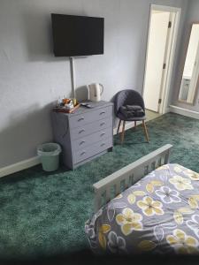 A television and/or entertainment center at Star And Garter 