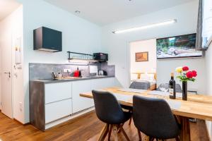 Kuchyňa alebo kuchynka v ubytovaní Apartmány Resort Vrchlabí