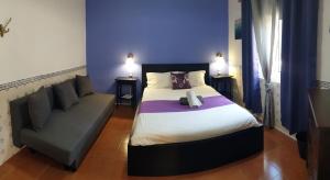 Cama ou camas em um quarto em Guesthouse of Alcobaça