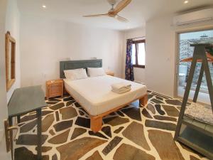 Cama o camas de una habitación en Dendrinos House