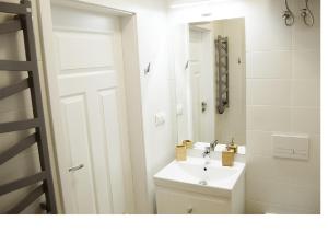 Łazienka w obiekcie Apartament na Jeziornej