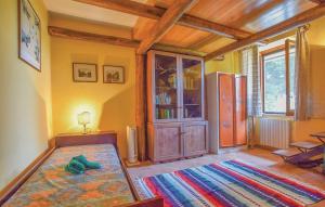 Posteľ alebo postele v izbe v ubytovaní Appartamenti Villa Ortensia