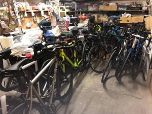 a group of bikes parked in a garage at Hotel des Alpes in Die