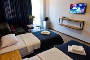 Voodi või voodid majutusasutuse Tskaltubo Epic Hotel & Spa toas