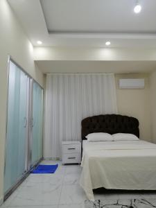 Кровать или кровати в номере Deniz Apart