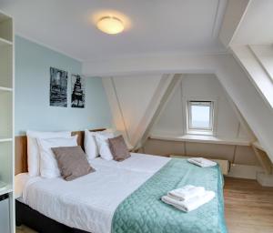Postel nebo postele na pokoji v ubytování Hotel Duinlust + 16 fotografií
