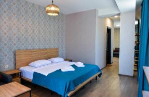 Voodi või voodid majutusasutuse Tskaltubo Epic Hotel & Spa toas