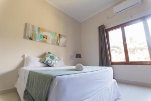 Postel nebo postele na pokoji v ubytování Bilene Home + 31 fotografií