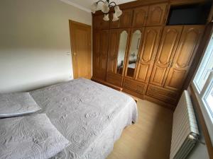 Cama ou camas em um quarto em Grupo Gontad Apartamento As Grelas Canduas 1