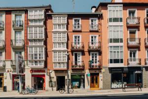 a group of buildings on a city street at Pensión Amaia in Vitoria-Gasteiz +53 photos