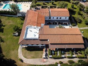 an aerial view of a house with a roof at White Sand Residence in Murta Maria