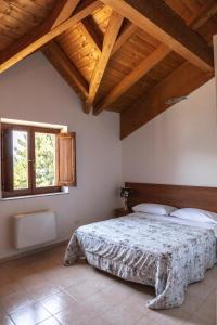 Кровать или кровати в номере Centro Sportivo Lorica