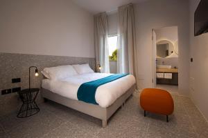 Postel nebo postele na pokoji v ubytování Elide Design Hotel