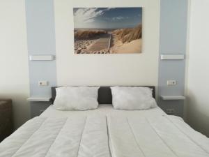 Postel nebo postele na pokoji v ubytování Ferienhaus Frank Saathoff