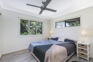 Ένα ή περισσότερα κρεβάτια σε δωμάτιο στο Moreton View