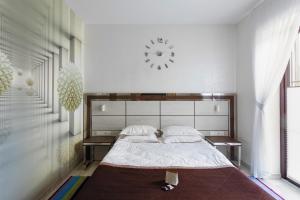 En eller flere senge i et værelse på Chalet TwoSeasons Bukovel