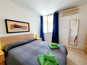 Posteľ alebo postele v izbe v ubytovaní Fuengirola Towers