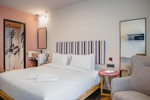 Pavo Art Hotel客房内的一张或多张床位