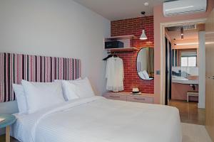 Pavo Art Hotel客房内的一张或多张床位