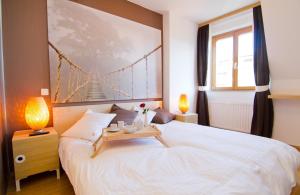 Postel nebo postele na pokoji v ubytování Zagreb Deluxe Apartment L2