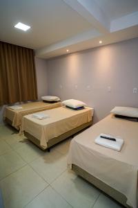 Ένα ή περισσότερα κρεβάτια σε δωμάτιο στο Hotel Diamantte