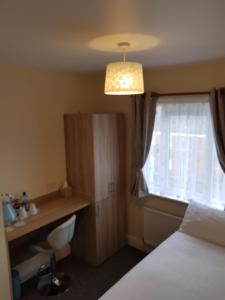 Postel nebo postele na pokoji v ubytování Bella Room with free minibar tea&coffee