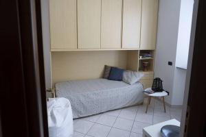A bed or beds in a room at La casa di Anna