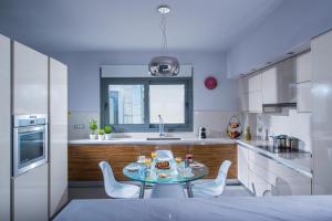 Kuchyň nebo kuchyňský kout v ubytování Coast Suite-Luxury Central Beach House + 16 fotografií