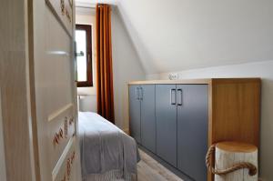 Postel nebo postele na pokoji v ubytování TATRY NA WYPASIE