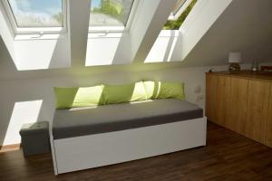 A bed or beds in a room at Landhof Böhm