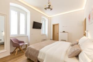 Postel nebo postele na pokoji v ubytování Luxury rooms in the center of Split - Maniva