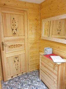 Łóżko lub łóżka w pokoju w obiekcie Apartamenty u Baców