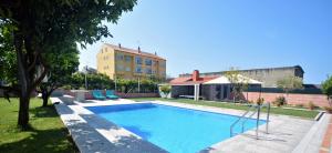 Bazén v ubytování Casa con piscina en Cambados nebo v jeho okolí