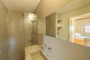 A bathroom at Avdos' olive house - land tales