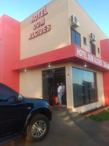 a car parked in front of a hotel dont unlocked at Hotel Dom Alcides in Nova Santa Medianeira