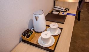 Příslušenství pro přípravu čaje a kávy v ubytování Hotel Shalom Jeju