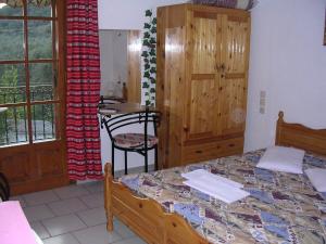 A bed or beds in a room at Anastasia