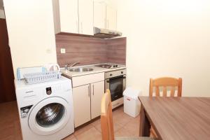 A kitchen or kitchenette at Apartments in Panorama Beach Vigo Nessebar