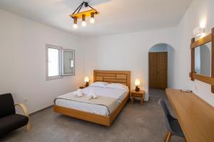 A bed or beds in a room at Petra Aqua Villa