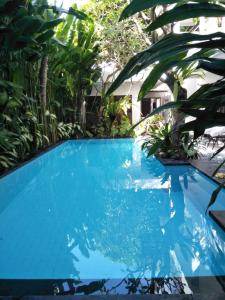 Bazén v ubytování The Pavilion Hotel Kuta nebo v jeho okolí