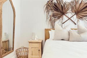 努薩公寓式酒店房間的床