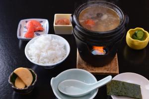 
a bowl of food on a table at Muroran Prince Hotel in Muroran
