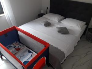 Postel nebo postele na pokoji v ubytování Apartmani Zlata
