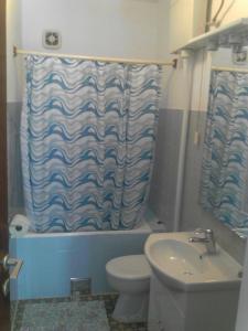 Um banheiro em Apartments Curin