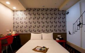 Voodi või voodid majutusasutuse Hotel 6 - ZhongHua toas