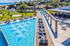 Bazén v ubytování Poseidon Palace nebo v jeho okolí